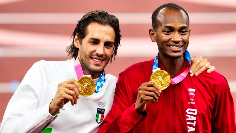 Italy's Gianmarco Tamberi (left) and Qatar's Mutaz Essa Barshim agreed to share gold in the high jump at Tokyo 2021.