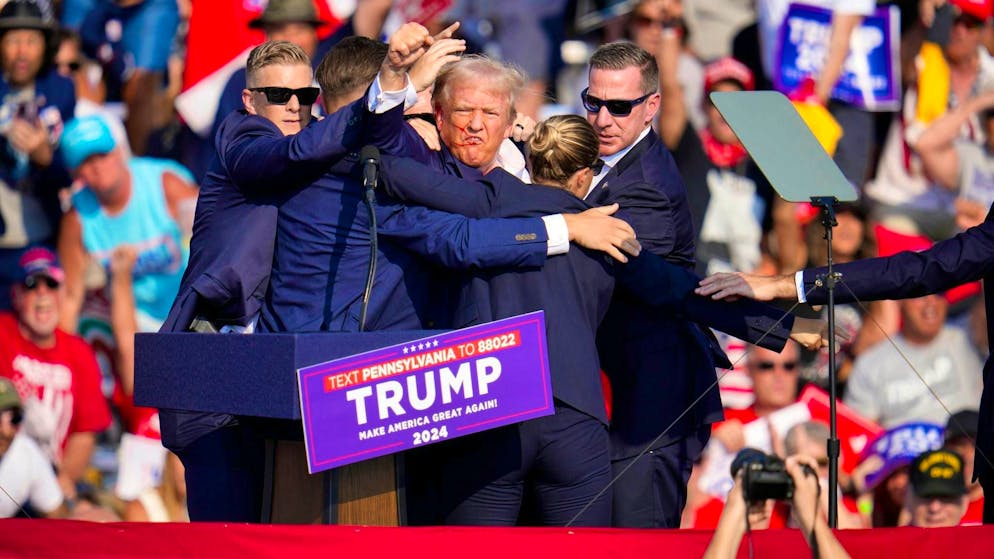 Attack on Trump during US election campaign - suspected shooter dead - Gallery. Trump's ear is bleeding.