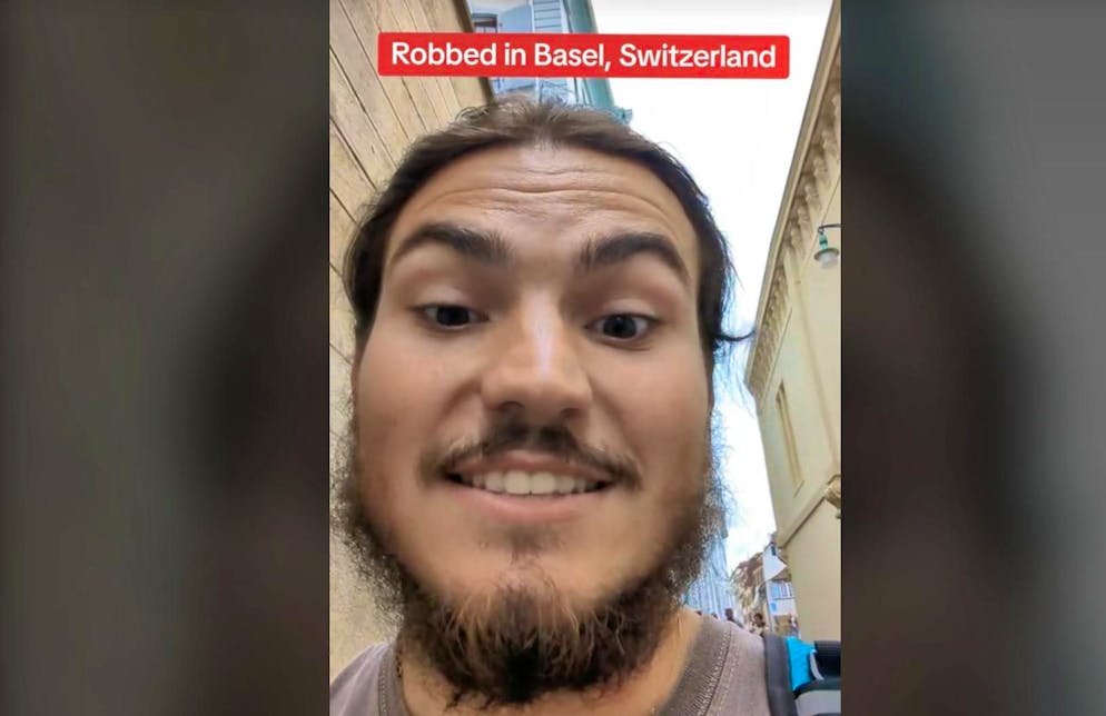 Brit Samuel Murray is traveling from the UK to Australia on his bike. He was robbed in Switzerland of all places.