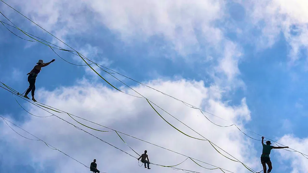 The world's best slackliners compete in Laax - Gallery. The highlines are between 65 and 110 meters long.