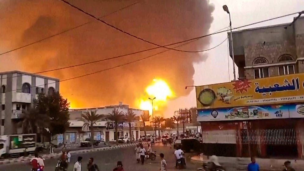 Smoke and flames rise from a building in this video still. The Israeli army says it has attacked several Houthi targets in western Yemen after the rebel group carried out a deadly drone strike in Tel Aviv the previous day. Photo: Uncredited/AP