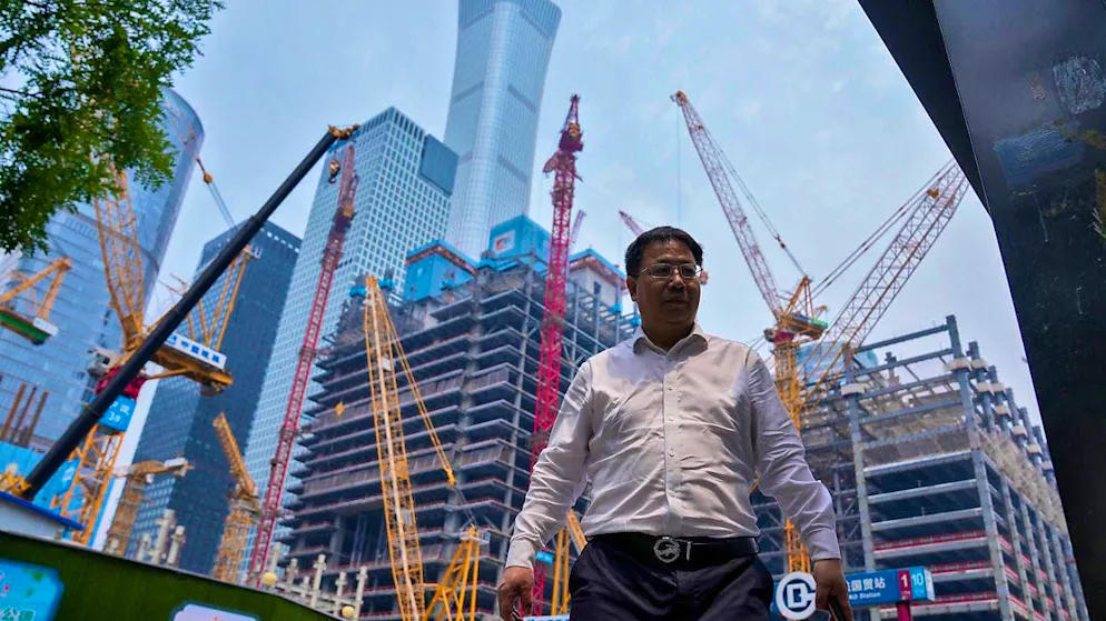 The Chinese central bank has cut two key interest rates. The country is facing an unprecedented crisis in the real estate sector