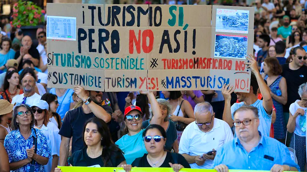 Participants at a demonstration against mass tourism in Mallorca. Photo: Clara Margais/dpa