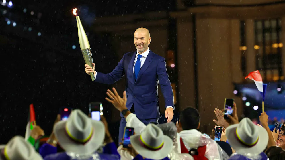 Olympic Opening Ceremony. Zinédine Zidane with the torch.