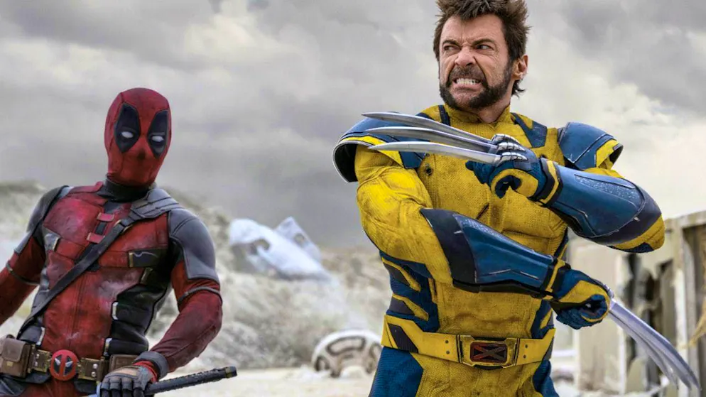 Ryan Reynolds as Deadpool/Wade Wilson, left, and Hugh Jackman as Wolverine/Logan jokingly celebrate the successful launch of their new movie. (archive picture)