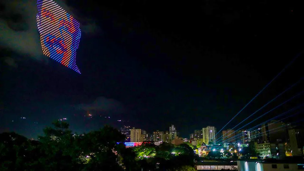 Drones show the image of President Nicolas Maduro over the Miraflores presidential palace after the electoral authorities declared him the winner of the presidential election. Photo: Cristian Hernandez/AP/dpa