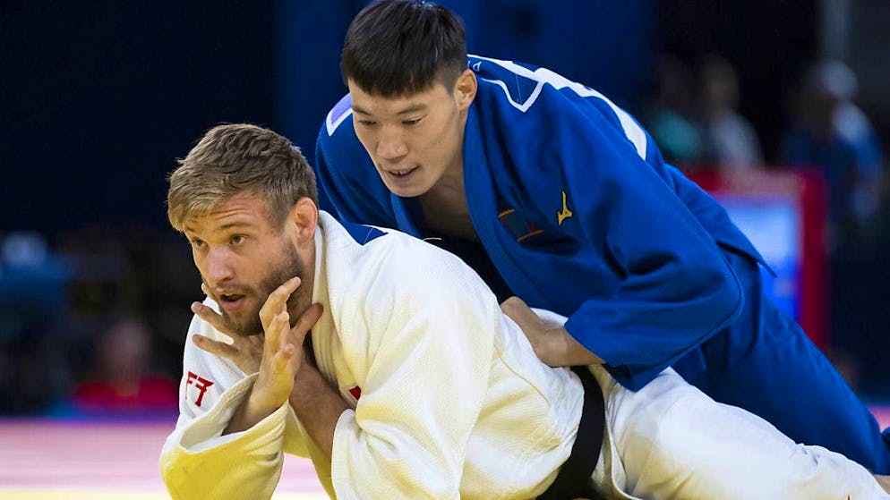 To his great disappointment, Nils Stump has to go down against Mongolian Erdenebayar Batzaya