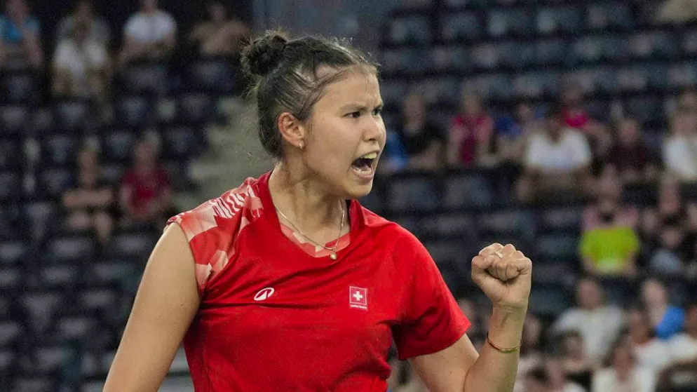 Swiss badminton player Jenjira Stadelmann clenches her fist after winning the point.