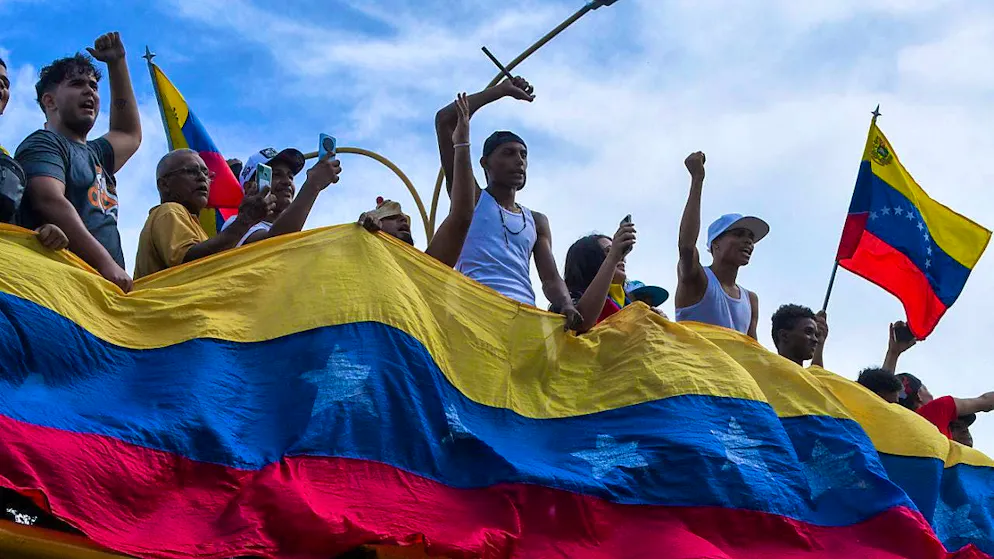 Demonstrators in Venezuela protest against the official election results after the presidential election. Photo: Jacinto Oliveros/AP
