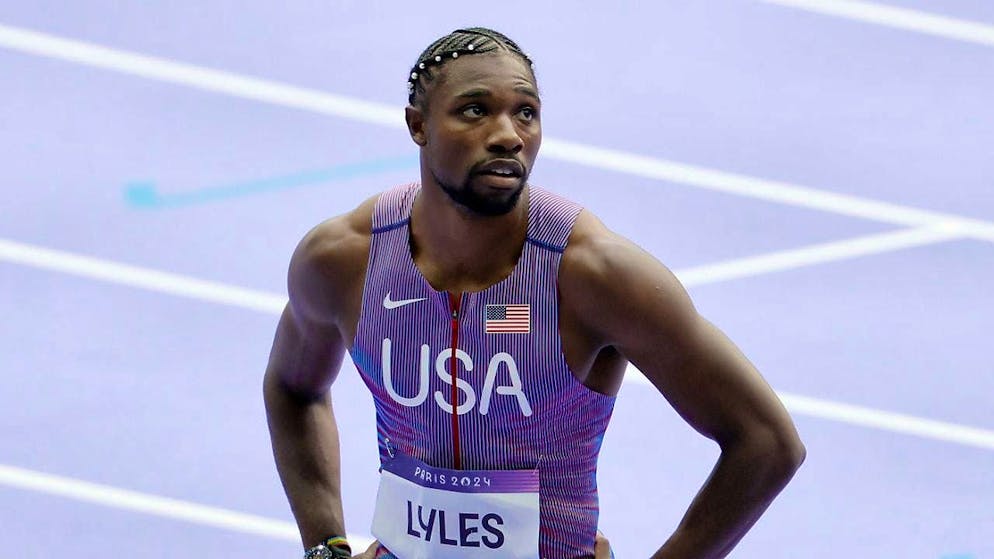 Noah Lyles narrowly wins the 100 m final in Paris