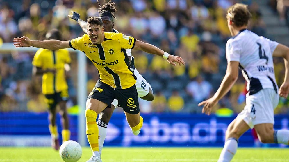 YB player Filip Ugrinic in a duel with Fernand Goure