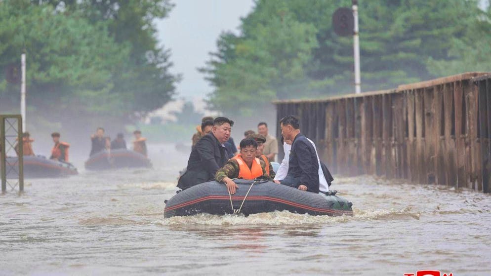 HANDOUT - According to KCNA, the photo shows Kim Jong Un, North Korea's ruler, inspecting flooded areas in Sinuiju in North Pyongan Province. Photo: Uncredited/kcna/kns/dpa - ATTENTION: For editorial use only and only with full attribution of the above credit