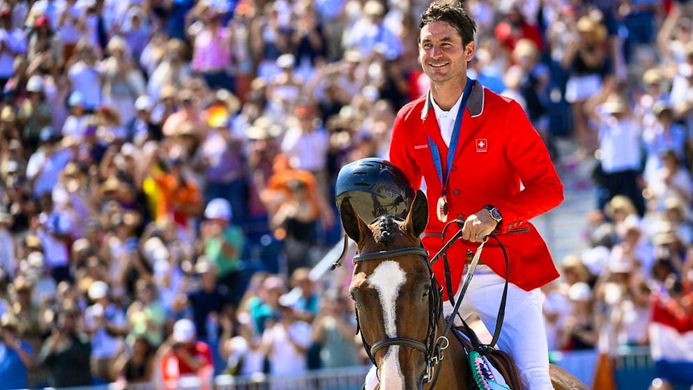 Joy as the driving force for two decades at the top of the world - Gallery. A reason to smile: Steve Guerdat secures his third Olympic medal in Versailles on Dynamix.