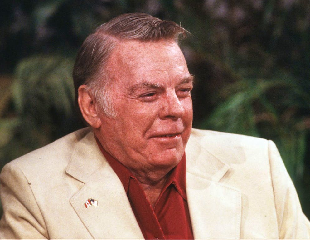 Paul N. "Red" Adair is seen in a November, 1980 photo, appearing on ABC's "Good Morning America" show. Adair, a world-renowned oil well firefighter who revolutionized the science of capping exploding and burning wells, died Saturday, August 7, 2004 in Houston, Texas, his daughter said. He was 89. (KEYSTONE/AP Photo)