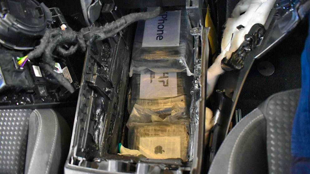 The drugs were hidden in the center console between the two front seats.