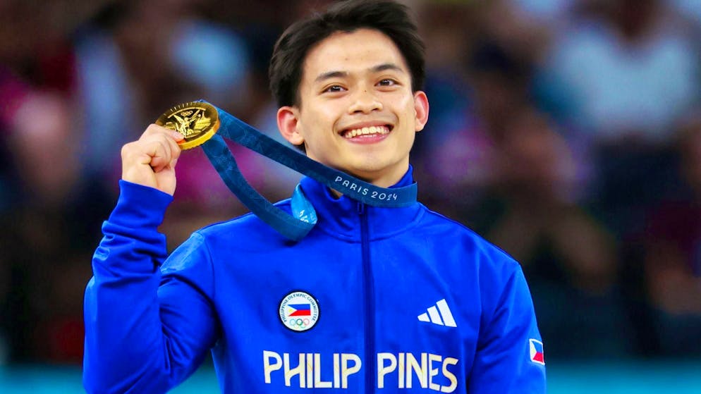 Carlos Yulo Edriel has reason to be happy - and not just because of his gold medal.
