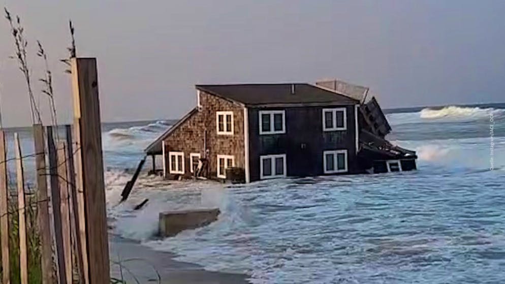 Hurricane Ernesto. Broken beach house on the US east coast floats away