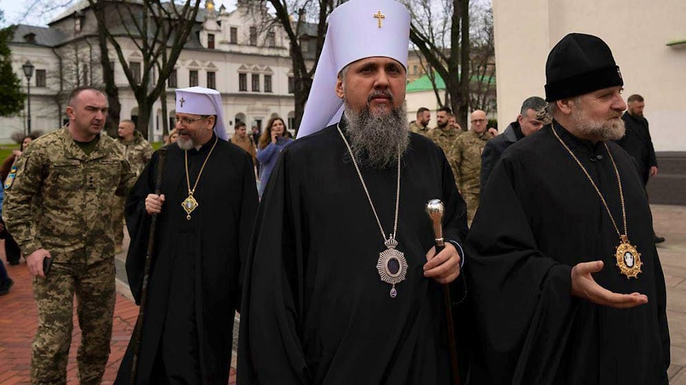 ARCHIVE - The head of the Orthodox Church of Ukraine, Metropolitan Epifany (M). Photo: Evgeniy Maloletka/AP/dpa