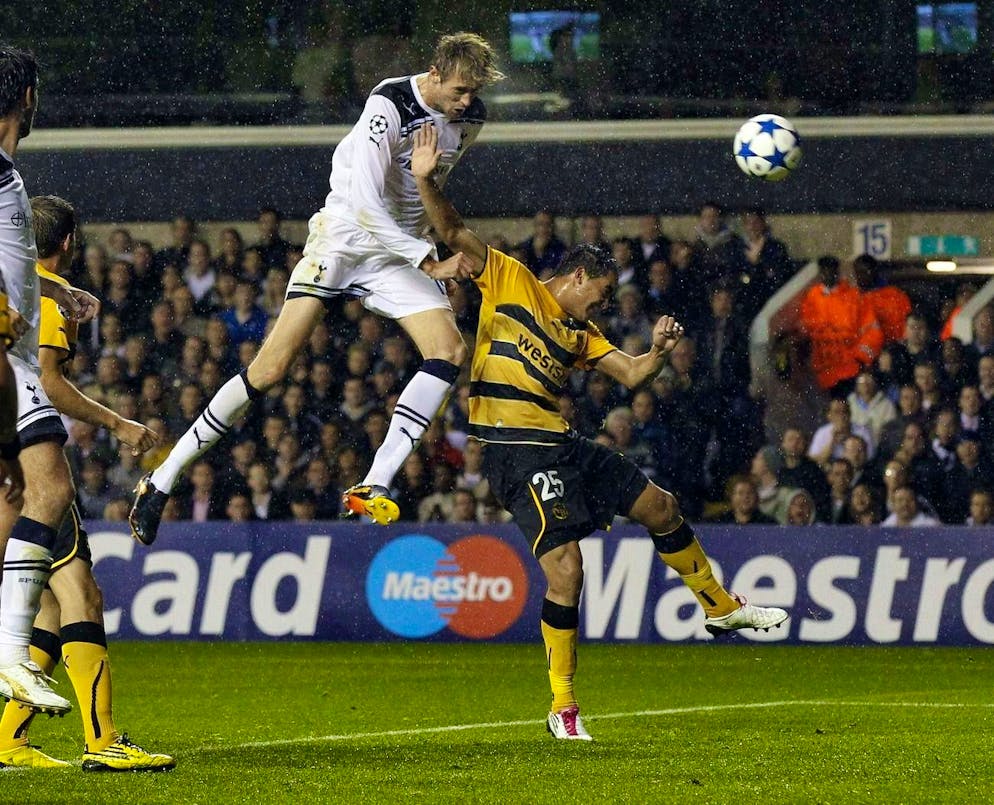 No defense: Peter Crouch takes off and nods in for Tottenham.