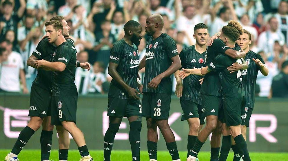 The Besiktas players celebrate a clear victory against Lugano