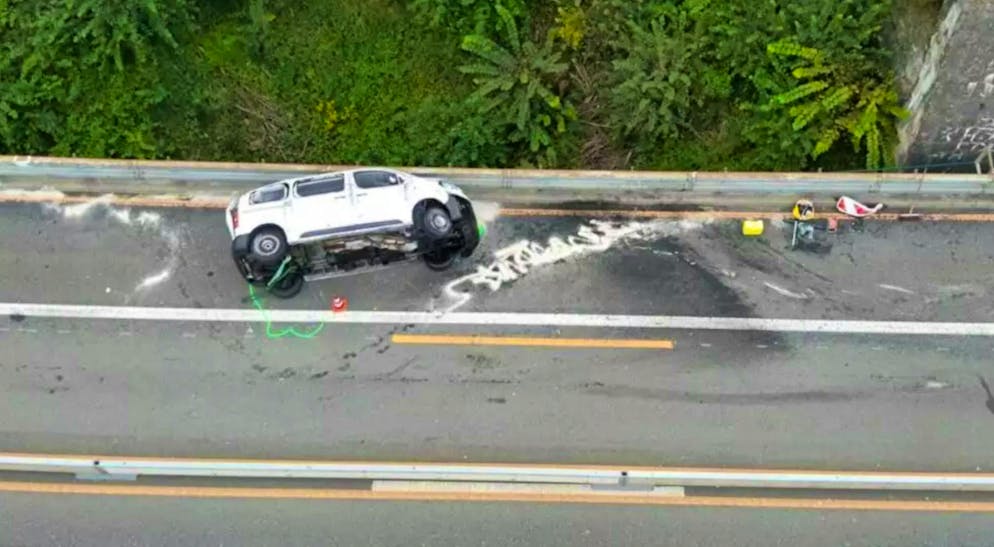 The car came to a standstill lying on its side.