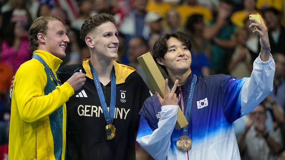 Kim Woo-min (à droite) avait bénéficié du soutien d'un coach australien en finale du 400 m, ce qui a déplu à Swimming Australia.