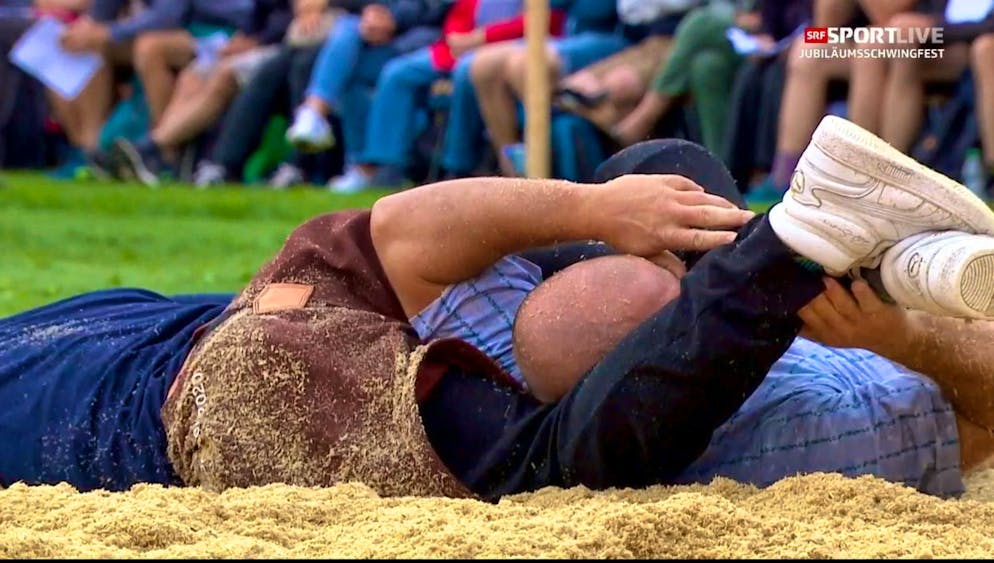 Lario Kramer pushes Marco Good into the sawdust.