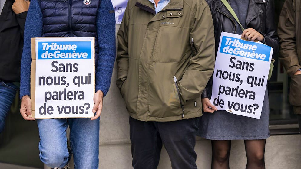 Uno dei cartelli polemici esposti durante l'azione a Ginevra.