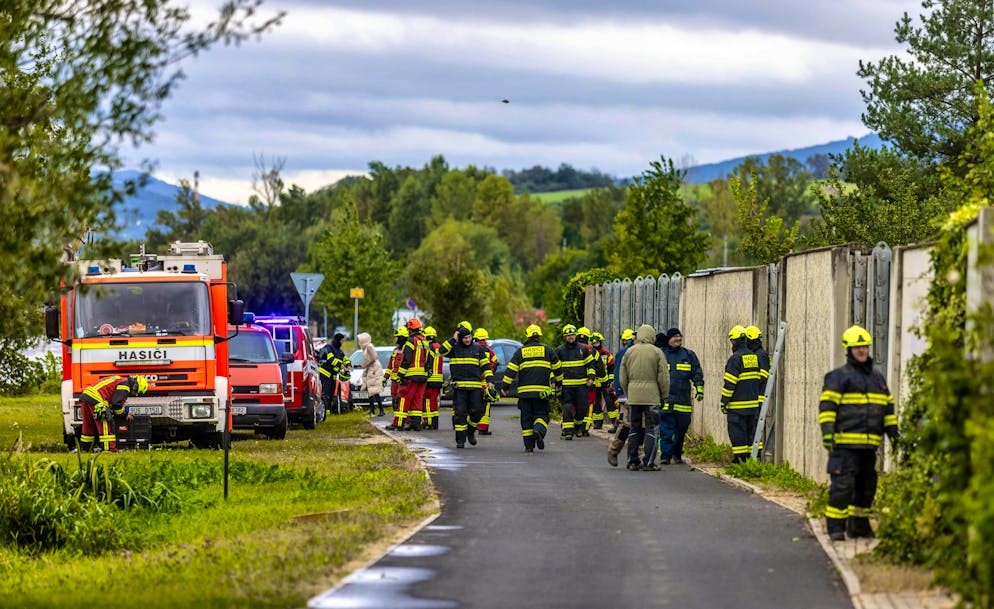 Firefighters build mobile flood barriers during heavy rainfall in Kresice, Leitmeritz region, Czech Republic, on September 14, 2024.