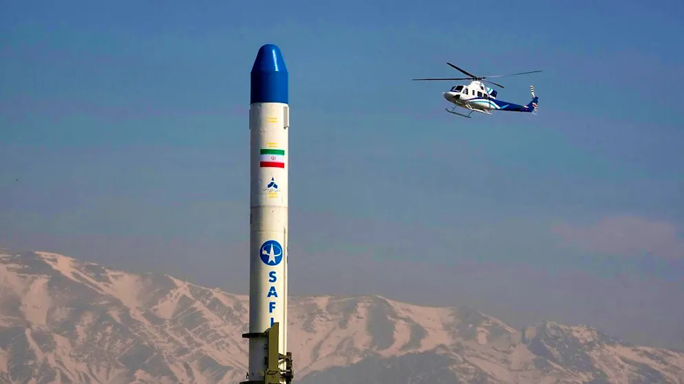 ARCHIVE - A helicopter flies over an Iranian satellite carrier. Photo: Vahid Salemi/AP/dpa