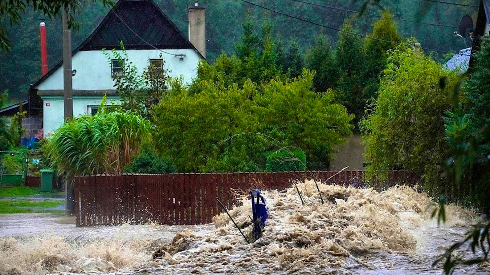 Debris collects on a small crossing on the Opavice River. In the Czech Republic, flood protection measures are in full swing. Photo: Petr David Josek/AP