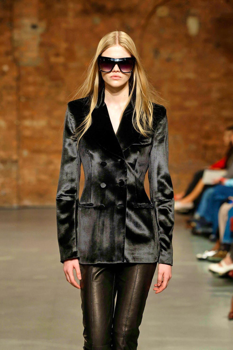 Designer Aron Esh offered a new kind of sex appeal: slim-fit leather pants, heeled ankle boots and transaparent vests or blouses.