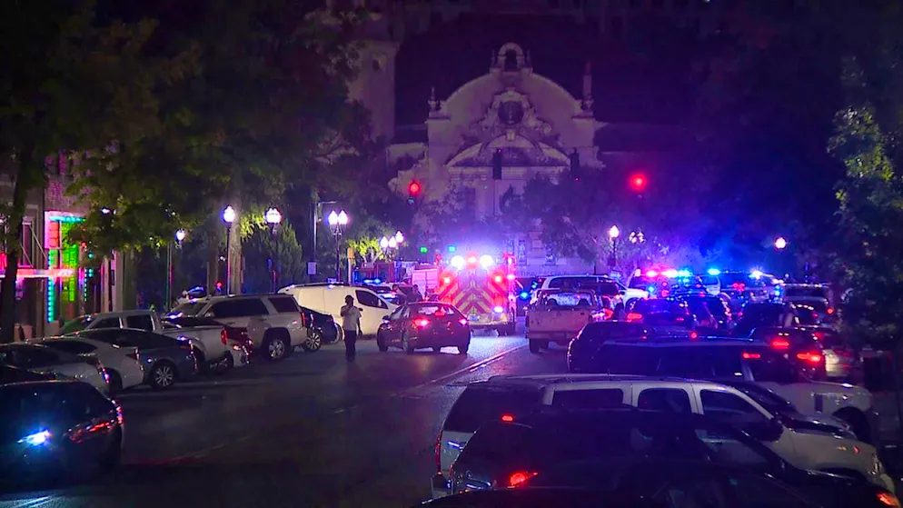 Police and rescue vehicles in the entertainment district of the US city of Birmingham after a shooting.