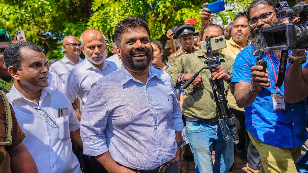 National People's Power leader and presidential candidate Anura Kumara Dissanayake leaves a polling station after casting his vote. Photo: Eranga Jayawardena/AP
