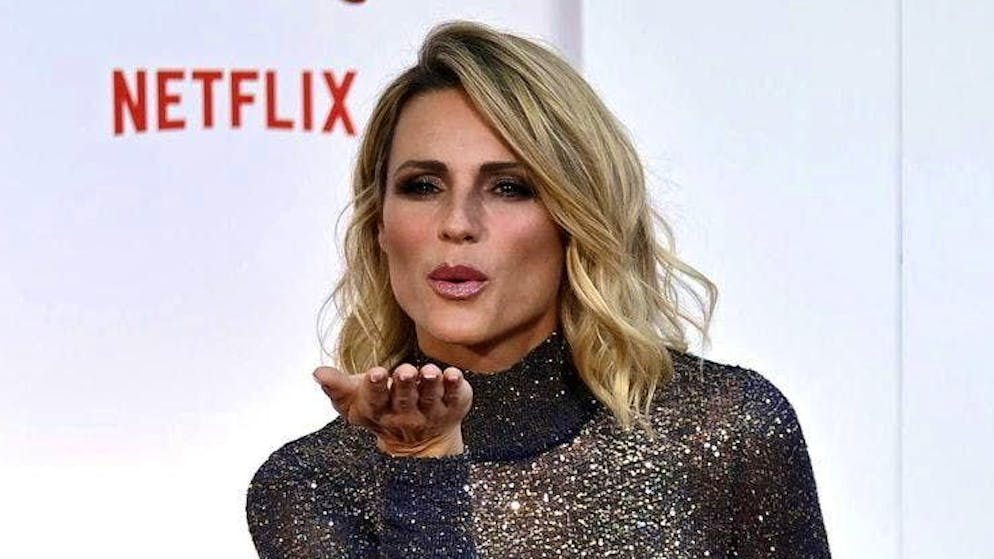 Entertainer Michelle Hunziker was caught flirting in Milan. snogging photos milan: michelle hunziker