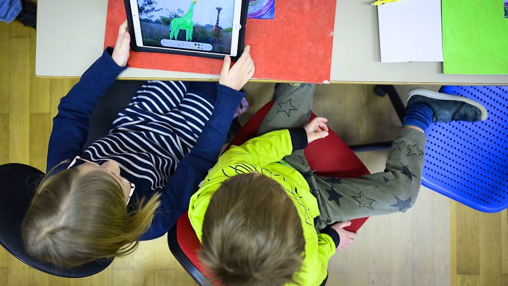 Le projet fribourgeois d'équipement numérique à l'école obligatoire prône "une utilisation raisonnée au service des apprentissages et à la hauteur des enjeux de la société" (photo d'illustration).