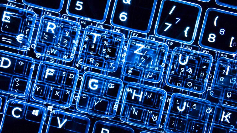 ARCHIVE - Keys of an illuminated keyboard (photo with zoom effect). Photo: Sebastian Gollnow/dpa