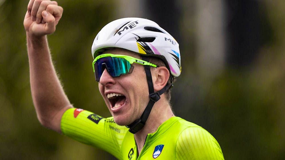 Tadej Pogacar cheers, exhausted after a very long solo ride