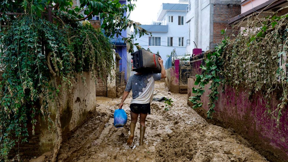 Latest news. Report: At least 200 dead in floods in Nepal
