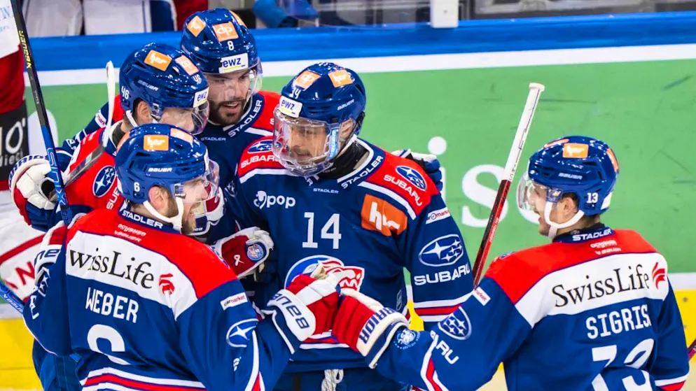 The Zurich players celebrate after the win against the Lakers