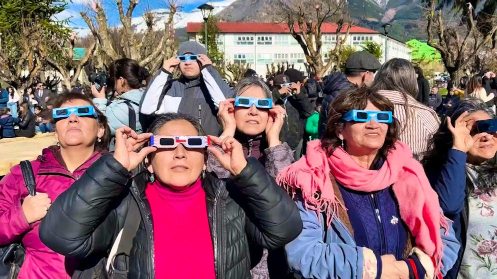 Many people in South America admire the solar eclipse.
