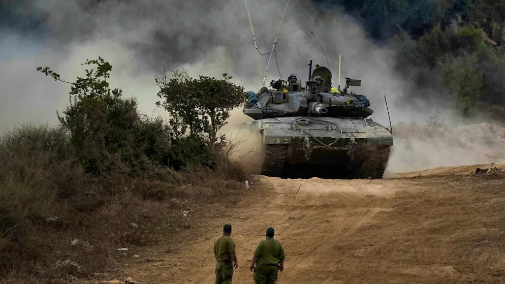ARCHIVE - Israeli army tanks maneuver in a staging area in northern Israel near the Israeli-Lebanese border. Photo: Baz Ratner/AP/dpa
