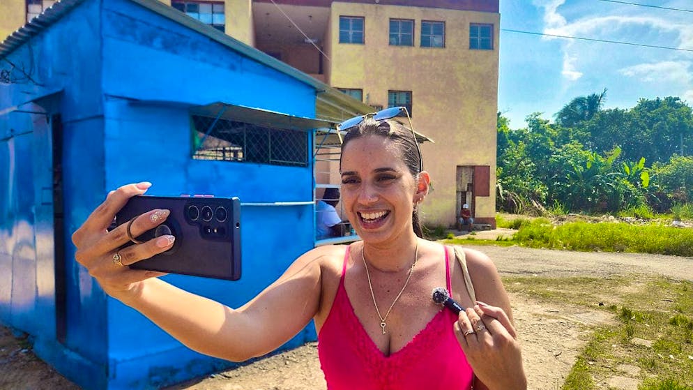 Cuban Youtuber Olivia Solis records a video for her channel in Reparto El Electrico, on the outskirts of Cuba's capital Havana.