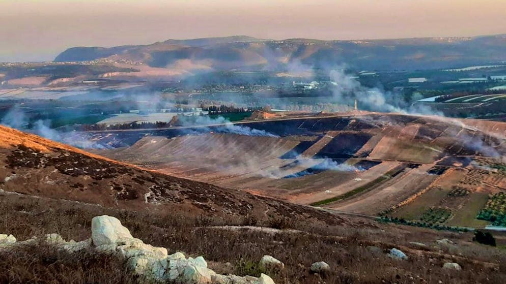 ARCHIVE - Smoke rises in the southern Lebanese border village of Maroun al-Ras. Photo: Mohammed Zaatari/AP/dpa