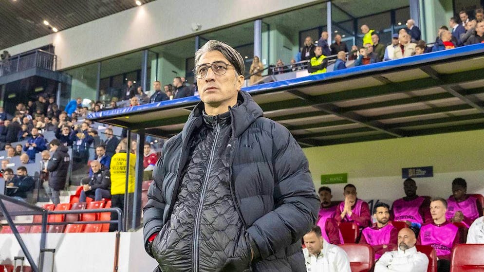 Swiss national coach Murat Yakin looks dismayed after the 2-0 defeat against Serbia