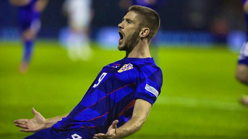 Andrej Kramaric celebrates his header to make it 2:1