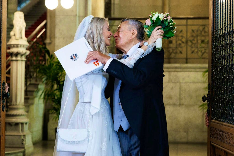 Entrepreneur Richard Lugner kisses Simone Reiländer at their civil wedding ceremony at Vienna City Hall on June 1, 2024.