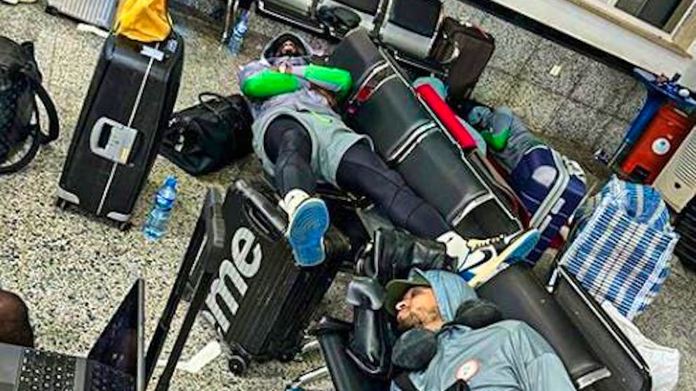 Sleeping under difficult circumstances - Nigeria professionals at the airport.