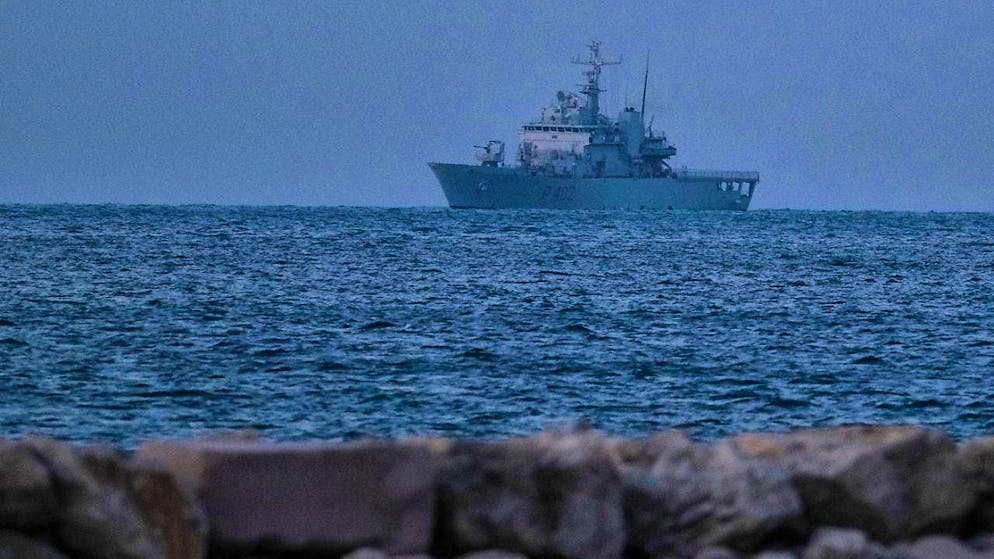 An Italian naval vessel approaches the port of Shengjin in northwestern Albania with the first group of migrants. Photo: Vlasov Sulaj/AP