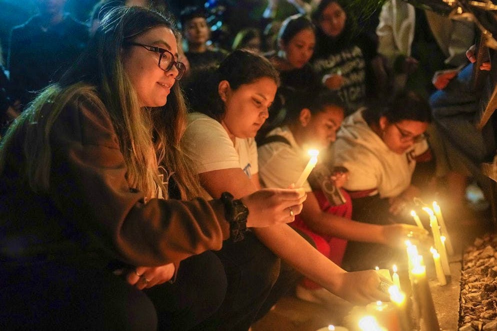 Fans commemorate their idol outside the hotel in Buenos Aires on Wednesday evening.
